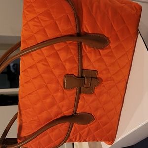 J. McClauglin diamond stitched purse.